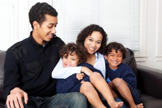 family sitting on a couch