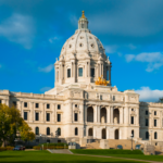 The Minnesota State Capitol building on a sunny day.