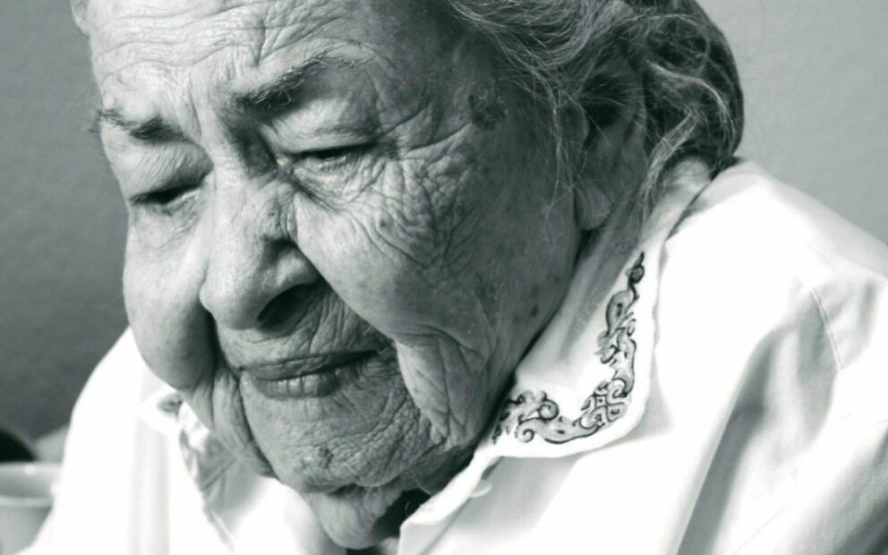 Black and white photo of elderly woman.