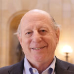 man smiling in capitol building