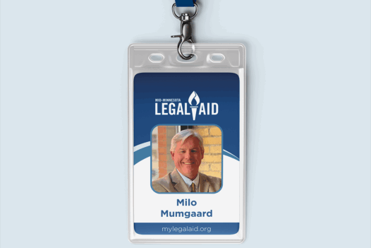 work ID badge with photo of a male employee