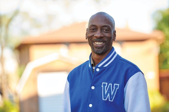man wearing blue jacket
