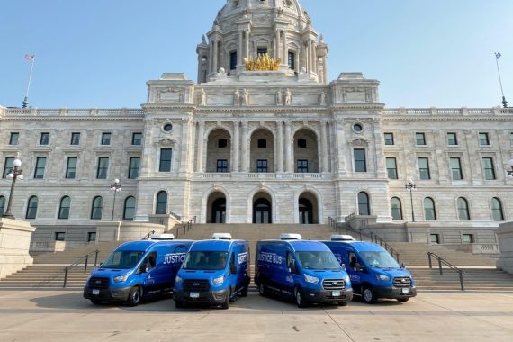 justice bus in front of the capitol