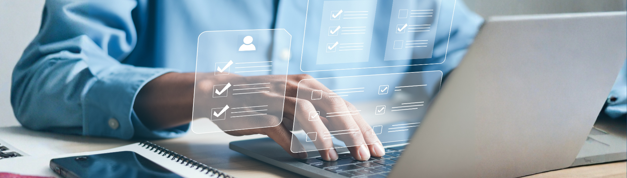 person typing on computer with checklist graphic in front